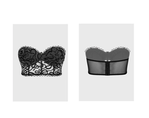 Detail of gothic black mesh corset top with dark snake pattern embroidery and back closure