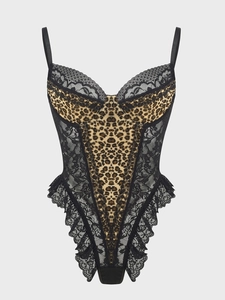 Close-up of sexy leopard print teddy lingerie with intricate black lace trim details