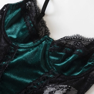 Deep green velvet bodysuit with black lace trim and adjustable spaghetti straps