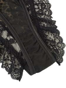 Close-up of leopard print mesh and ruffled floral lace detailing on black bodysuit