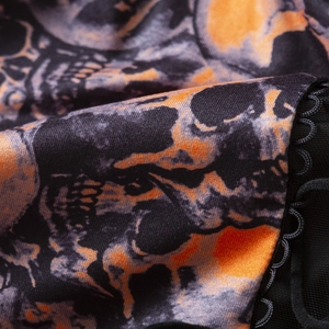 Body sexy di Halloween con stampa a scheletro, motivi ossei arancioni e dettagli in pizzo nero