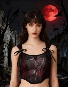 Detail of gothic camisole featuring grim reaper print and satin bow on spiderweb fabric