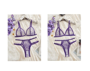 Detail of purple lace lingerie set with mesh texture and adjustable straps on silk background