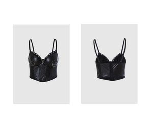 Front and back detail of a punk faux leather corset top with rivet and cross charms