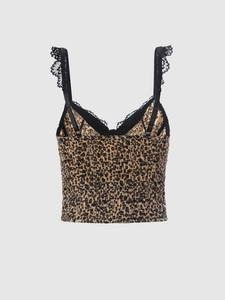 Detail view of leopard print camisole featuring black lace trim and shirred elastic back