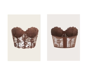 Detail view showing floral embroidery and transparent mesh corset top with back hook-and-eye closure
