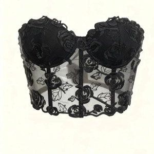 Black mesh bustier top with 3D floral embroidery and lace boning details