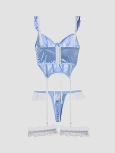 Detail of light blue satin and lace lingerie set with ruffled straps and garter belts