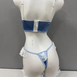 Three-piece light blue lace maid uniform lingerie set with thong shown from behind