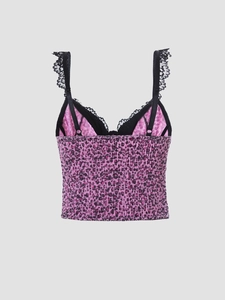 Detail of pink leopard print velvet camisole with black lace trim and smocked texture