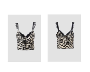 Detail view showing zebra print pattern, lace-up front, and black lace trim on camisole top