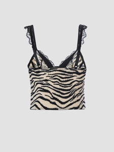 Detailed view of Y2K zebra print camisole with black lace trim and ruched texture