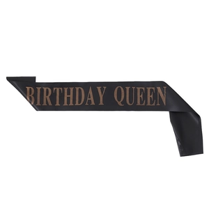 Elegant black satin sash with sparkling rose gold Birthday Queen lettering for parties