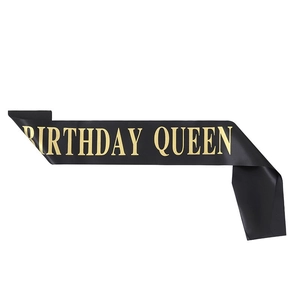 Black satin birthday queen sash with elegant gold foil lettering for party decor