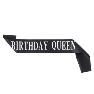 Elegant black satin Birthday Queen sash with bold white lettering for birthday party decor