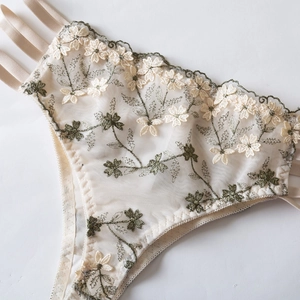 French mesh lingerie set with floral embroidery and side triple-strap detail