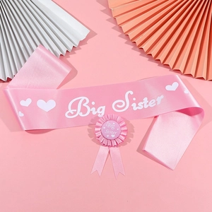 Pink satin Big Sister sash and flower badge set for baby shower party celebrations