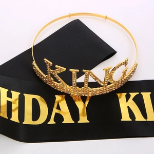 Detail of gold rhinestone KING crown and black satin BIRTHDAY KING sash for men