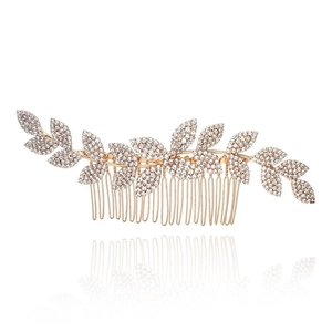 Elegant gold leaf hair comb with sparkling rhinestones for bridal hair styling