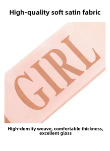 Detail of rose gold BIRTHDAY GIRL lettering on premium soft pink satin party sash