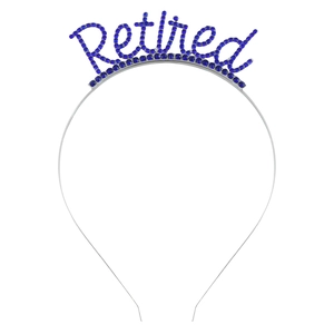 Detailed close-up of a silver Retired headband with sparkling navy blue rhinestones