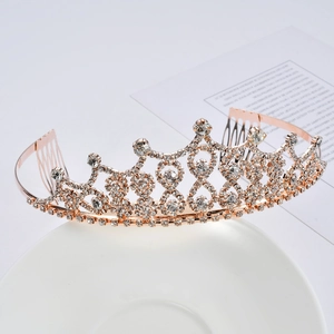 Elegant rose gold bridal tiara with sparkling crystal rhinestones for wedding hair decoration