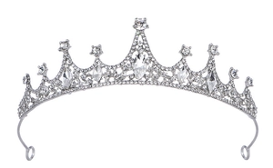 Macro detail of silver crystal crown showing intricate rhinestones and side fixing loops