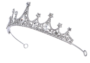 Detailed close-up of a silver crystal tiara with intricate marquise rhinestone settings
