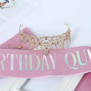 Close-up of pink glitter Birthday Queen sash and gold rhinestone crown party set