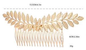 Detailed view of leaf-shaped golden alloy hair comb with size and weight dimensions