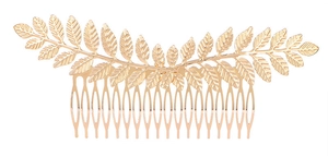 Detailed view of a golden vintage alloy leaf hair comb with symmetric feather patterns