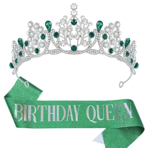 Birthday Queen set featuring a silver crown with emerald gems and a green glitter sash