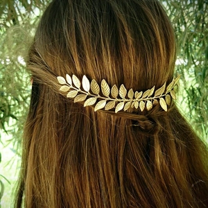Elegant gold metal laurel leaf hair comb accessory for bridal hairstyles and weddings