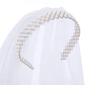 Elegant bridal headband with triple-row pearls and silver geometric frame for weddings