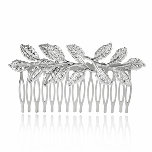 Elegant silver leaf bridal hair comb with detailed metal textures on a white background
