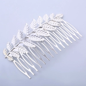 Elegant silver leaf pattern hair comb headpiece with detailed metal foliage design