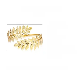 Adjustable golden metal leaf arm cuff with interlocking leaf design, 5.5cm height