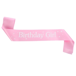Pink satin Birthday Girl sash with white star patterns for party celebrations