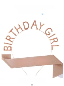 Detail of rose gold birthday girl set featuring a rhinestone headband and glitter sash