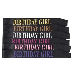 Set of six black satin Birthday Girl sashes with multi-colored glitter lettering