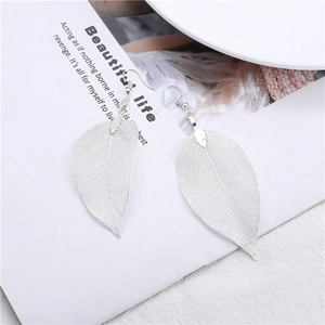 Silver leaf earrings with detailed filigree veins and elegant drop hooks for women