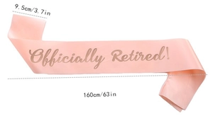 Detail showing the 160cm length and 9.5cm width dimensions of the pink retirement sash