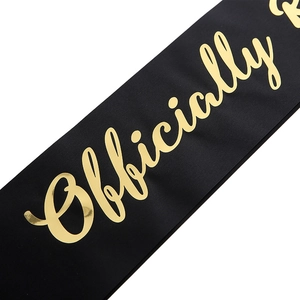 Elegant black satin sash with gold foil Officially Retired script for party decoration