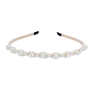 Elegant white pearl headband for women featuring a wavy beaded design on thin metal frame