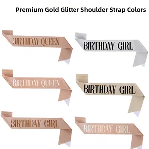 Macro shot of glitter birthday girl and queen sashes in various metallic colors