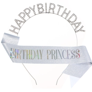 Detail of silver birthday tiara and glitter sash set with holographic lettering
