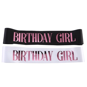 Pink and purple Birthday Girl sashes in black and white satin with metallic lettering