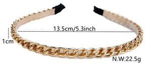 Detail view of a 1cm wide gold metal chain headband with 13.5cm width and fabric tips
