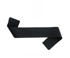 Detail of high-quality black satin sash with vibrant colorful Happy Birthday printed text