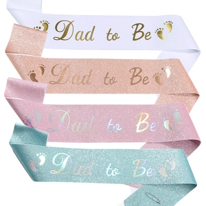 Set of four glittering Dad to Be sashes in white, rose gold, pink, and blue for parties